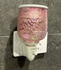 Pink small Pluggable electric warmer