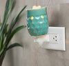 Turquoise pluggable small electric warmer