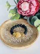 Black lava bead bracelet - 10mm beads with large yellow agate heart.