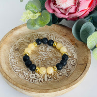 Black lava bead bracelet with honey jade beads
